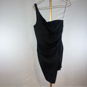 Skin tight black with gold dots dress